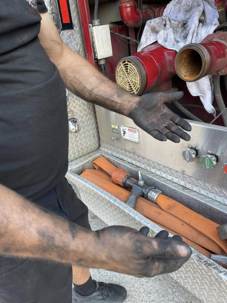 Rescue Wrench LLC diesel technician with dirty heands