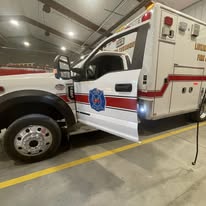 Rescue Wrench LLC diesel technician working on emergency apparatus