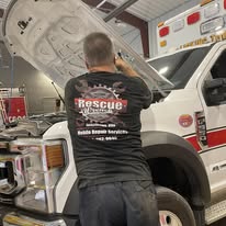 Rescue Wrench LLC diesel technician working on emergency apparatus